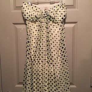 Strapless ivory dress with polka dot detail
